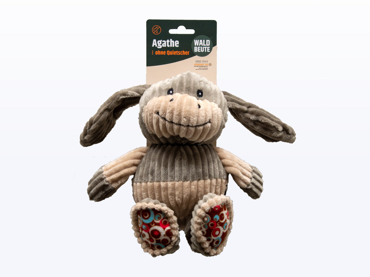 Das WALDBEUTE Hundespielzeug Agathe von Waldbeute ist ein Plüschspielzeug in Form eines lächelnden Esels mit Schlappohren, beige-braunem Strukturstoff, gemusterten Füßen, ohne Quietsche. Öko-Tex-zertifiziert und maschinenwaschbar bei 30°C.